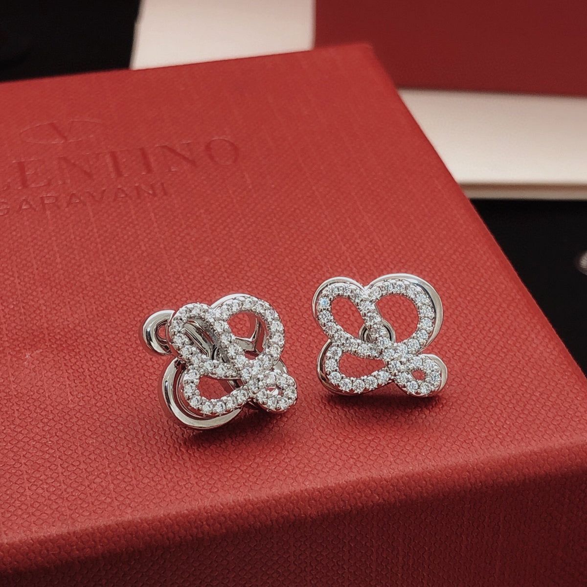 Sculptural Stud Earrings in Polished Metal-Tone with Crystal-Style Accents styled view