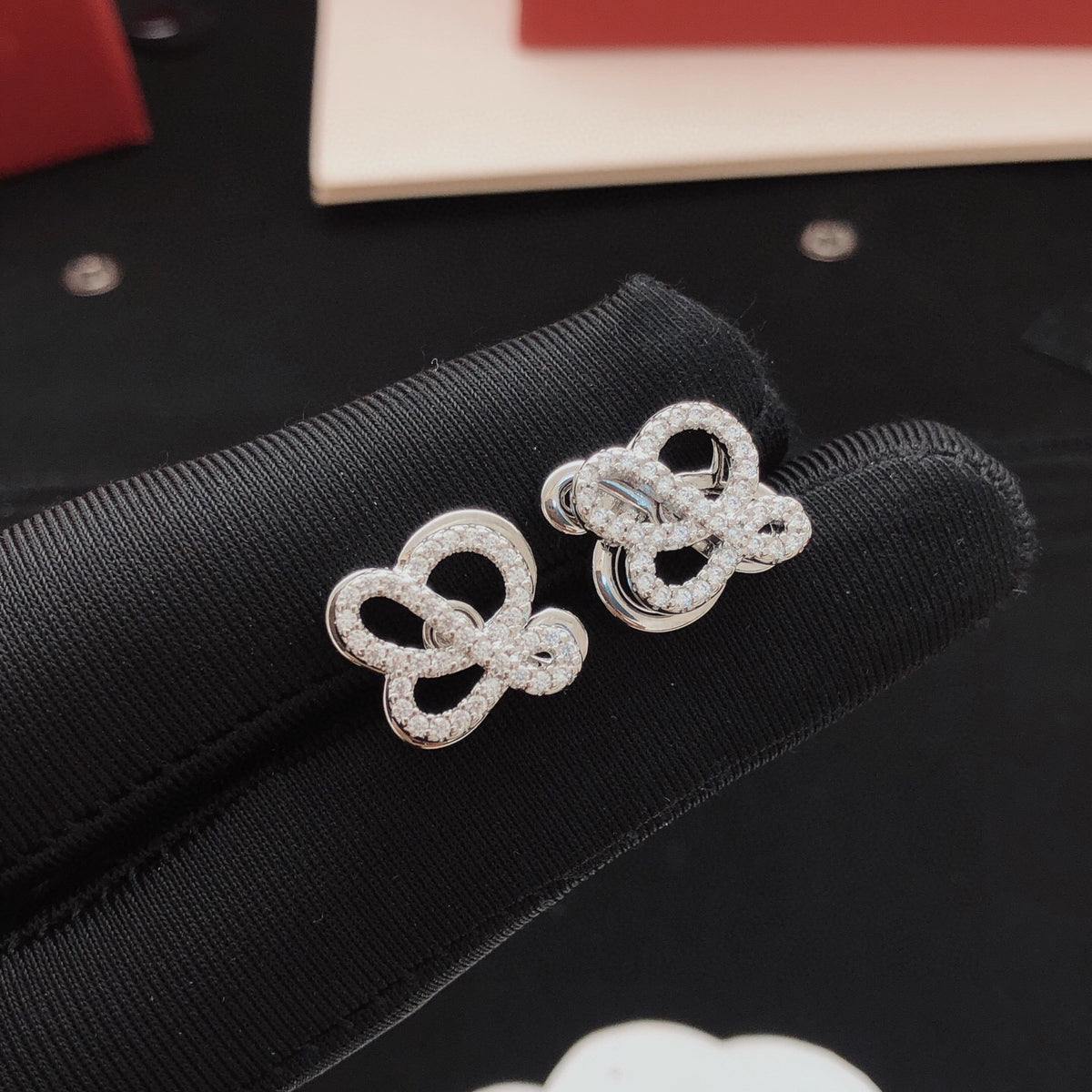 Sculptural Stud Earrings in Polished Metal-Tone with Crystal-Style Accents detail view