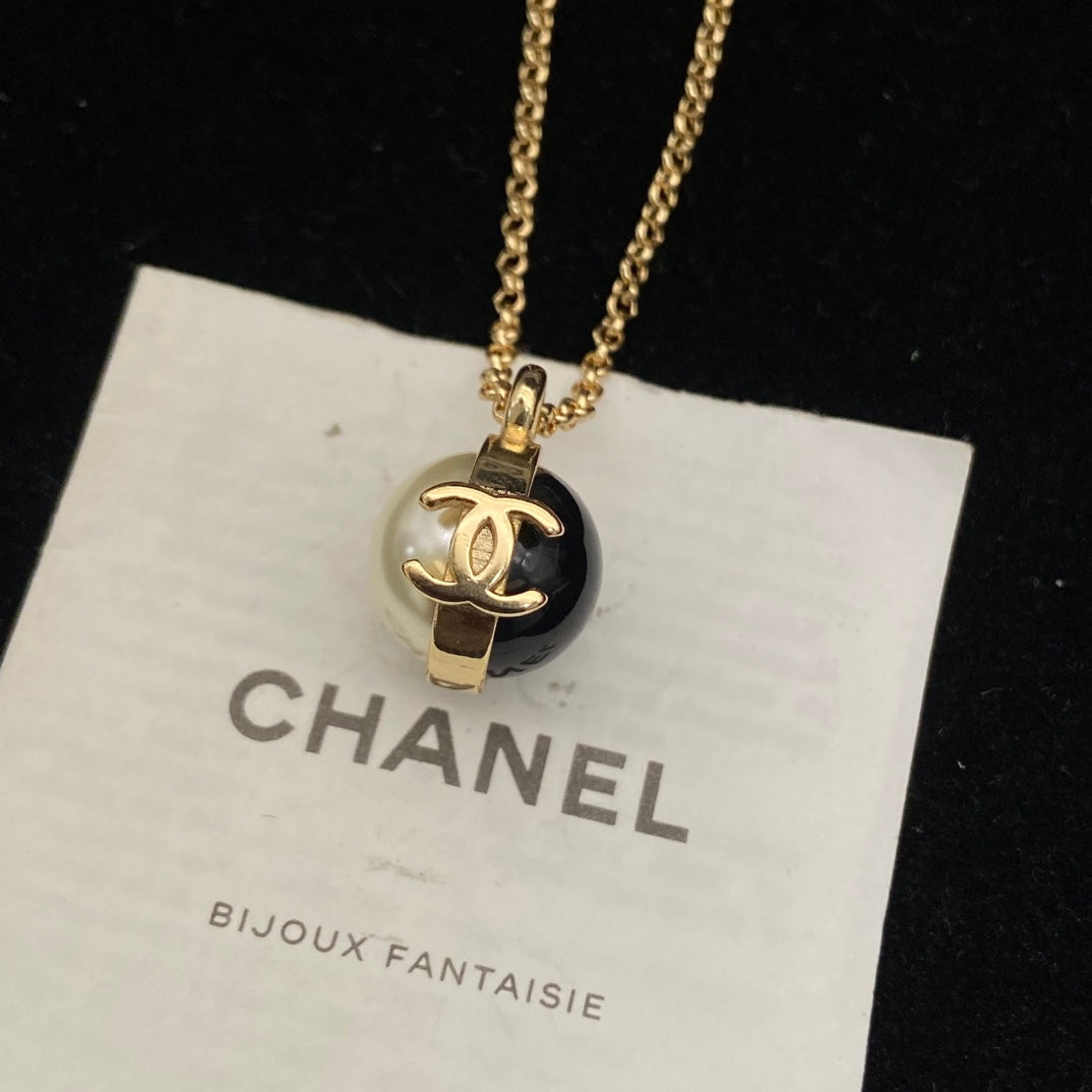 Double-C Emblem Pearl-Detail Pendant Necklace – Pearl Detail – Design 065 close-up detail