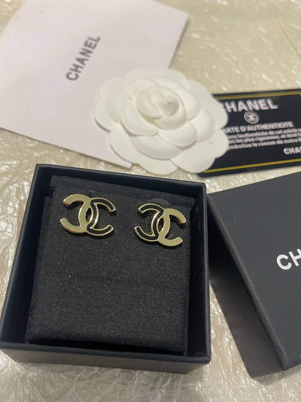 Double-C Emblem Stud Earrings in Polished Metal-Tone – Black Detail – Design 003 detail view
