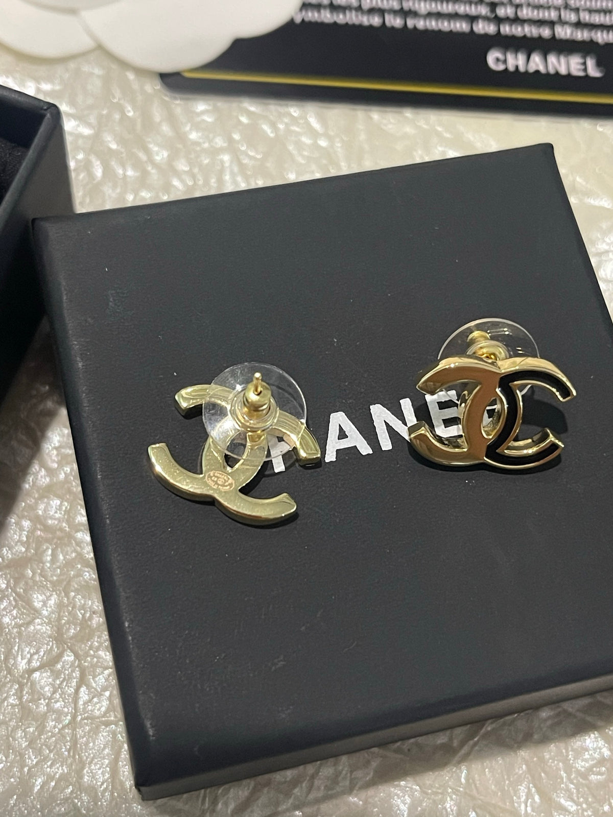 Double-C Emblem Stud Earrings in Polished Metal-Tone – Black Detail – Design 003 styled product view