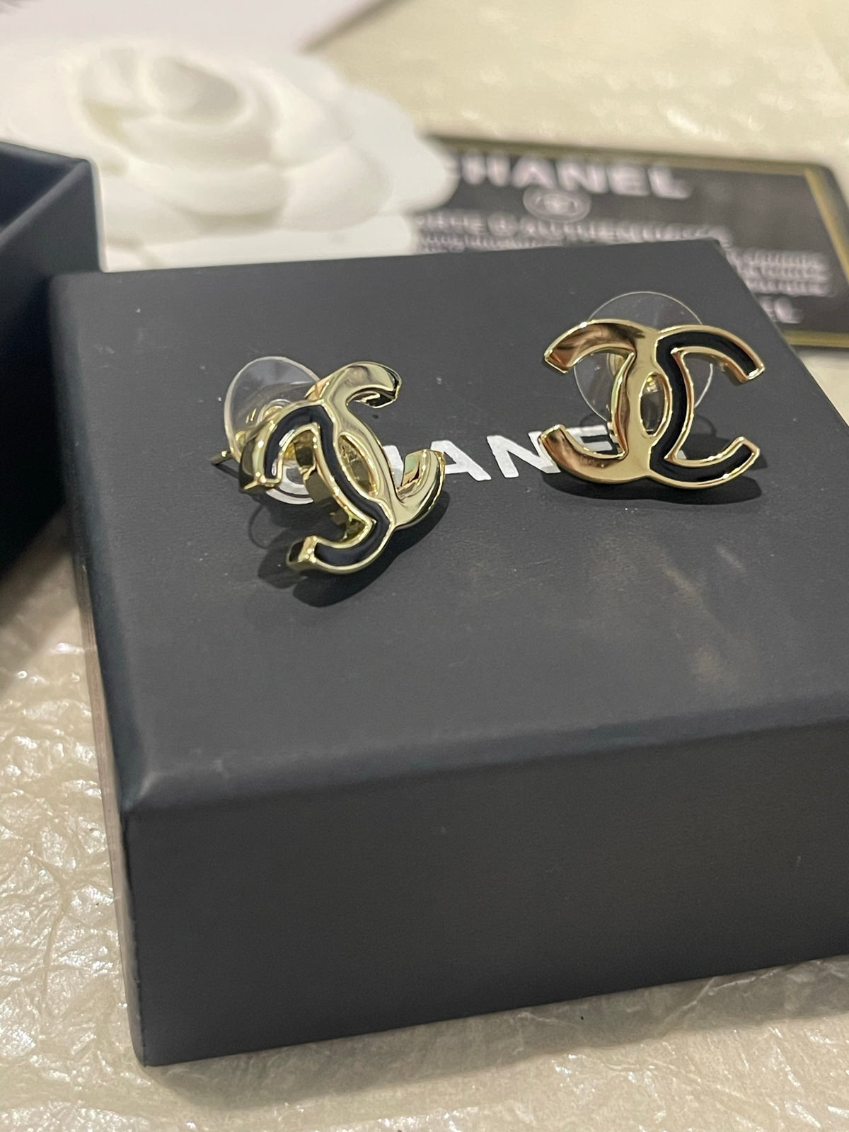 Double-C Emblem Stud Earrings in Polished Metal-Tone – Black Detail – Design 003 main product view