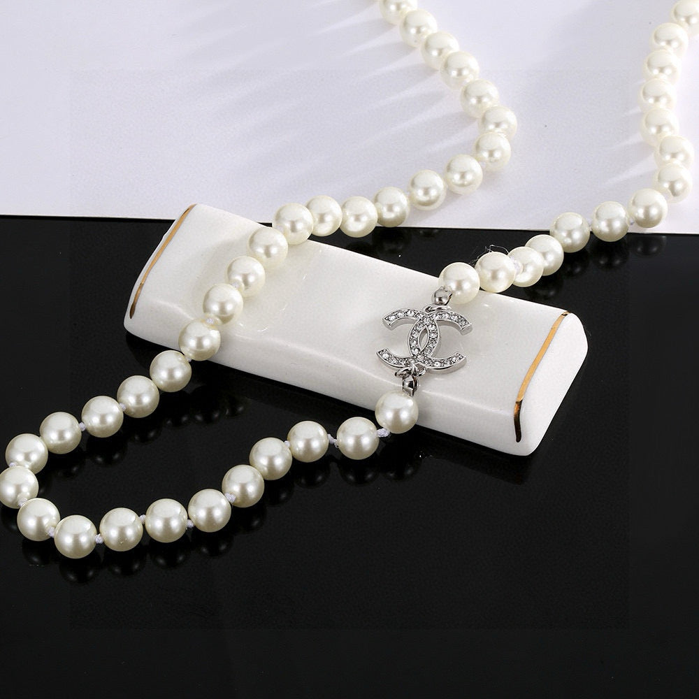 Double-C Emblem Pearl-Detail Pendant Necklace – Pearl Detail – Design 054 detail view