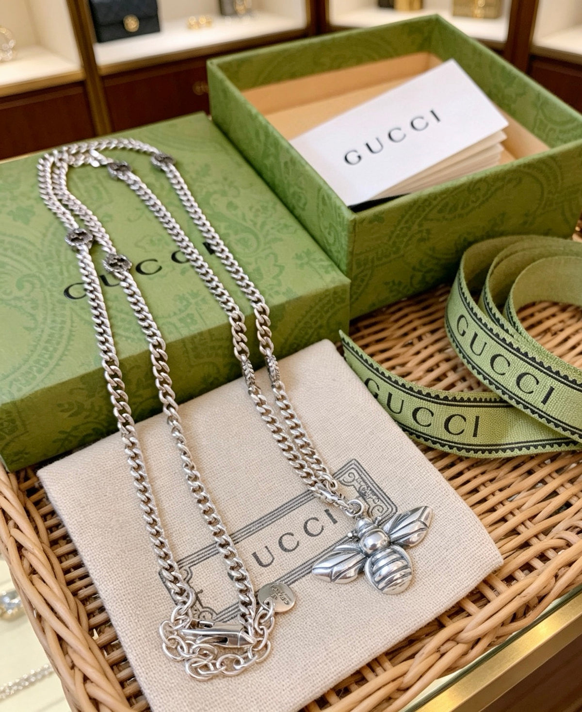 Double-G Emblem Pendant Necklace in Polished Metal-Tone – Bee Detail detail view