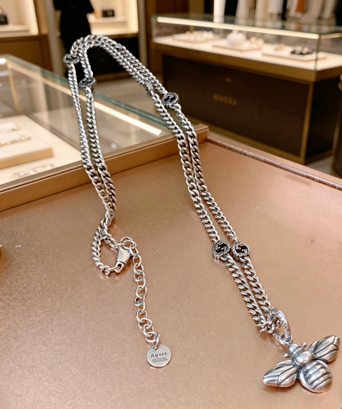 Double-G Emblem Pendant Necklace in Polished Metal-Tone – Bee Detail styled product view