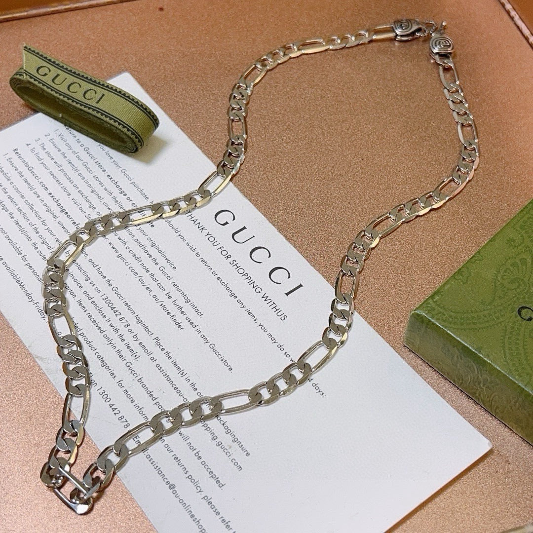 Double-G Emblem Pendant Necklace in Polished Metal-Tone – Vintage Detail – Design 030 close-up detail