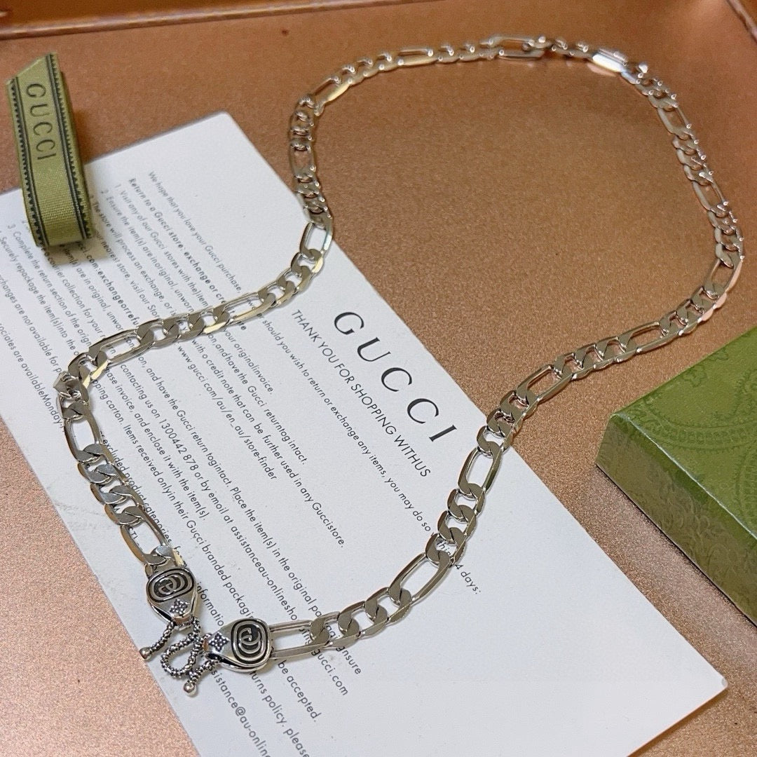 Double-G Emblem Pendant Necklace in Polished Metal-Tone – Vintage Detail – Design 030 main product view