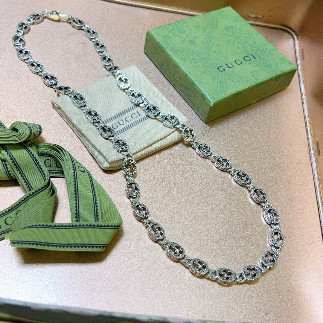 Double-G Emblem Pendant Necklace in Polished Metal-Tone – Vintage Detail – Design 029 styled product view