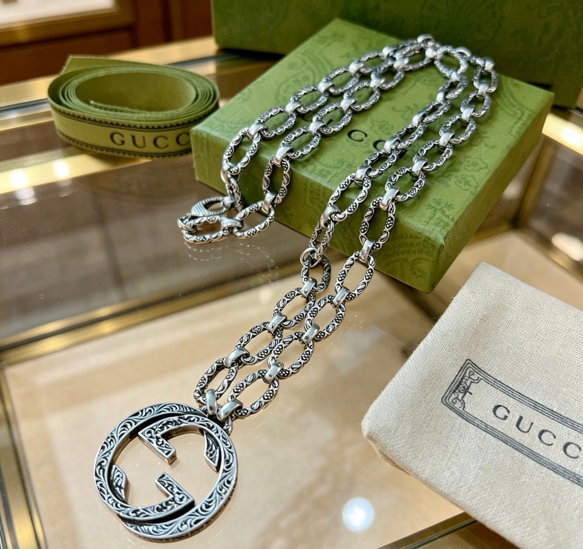 Double-G Emblem Pendant Necklace in Polished Metal-Tone – Design 118 close-up detail