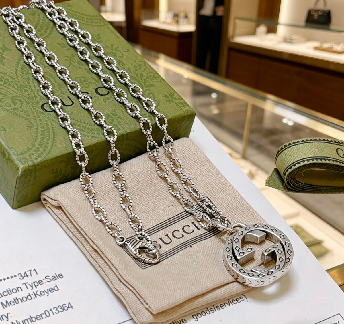 Double-G Emblem Pendant Necklace in Polished Metal-Tone – Design 129 close-up detail