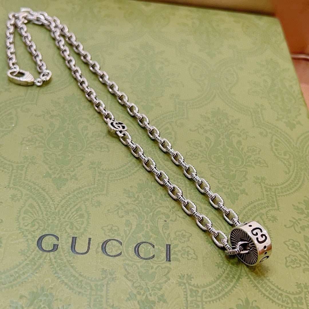 Double-G Emblem Pendant Necklace in Polished Metal-Tone – Design 126 close-up detail