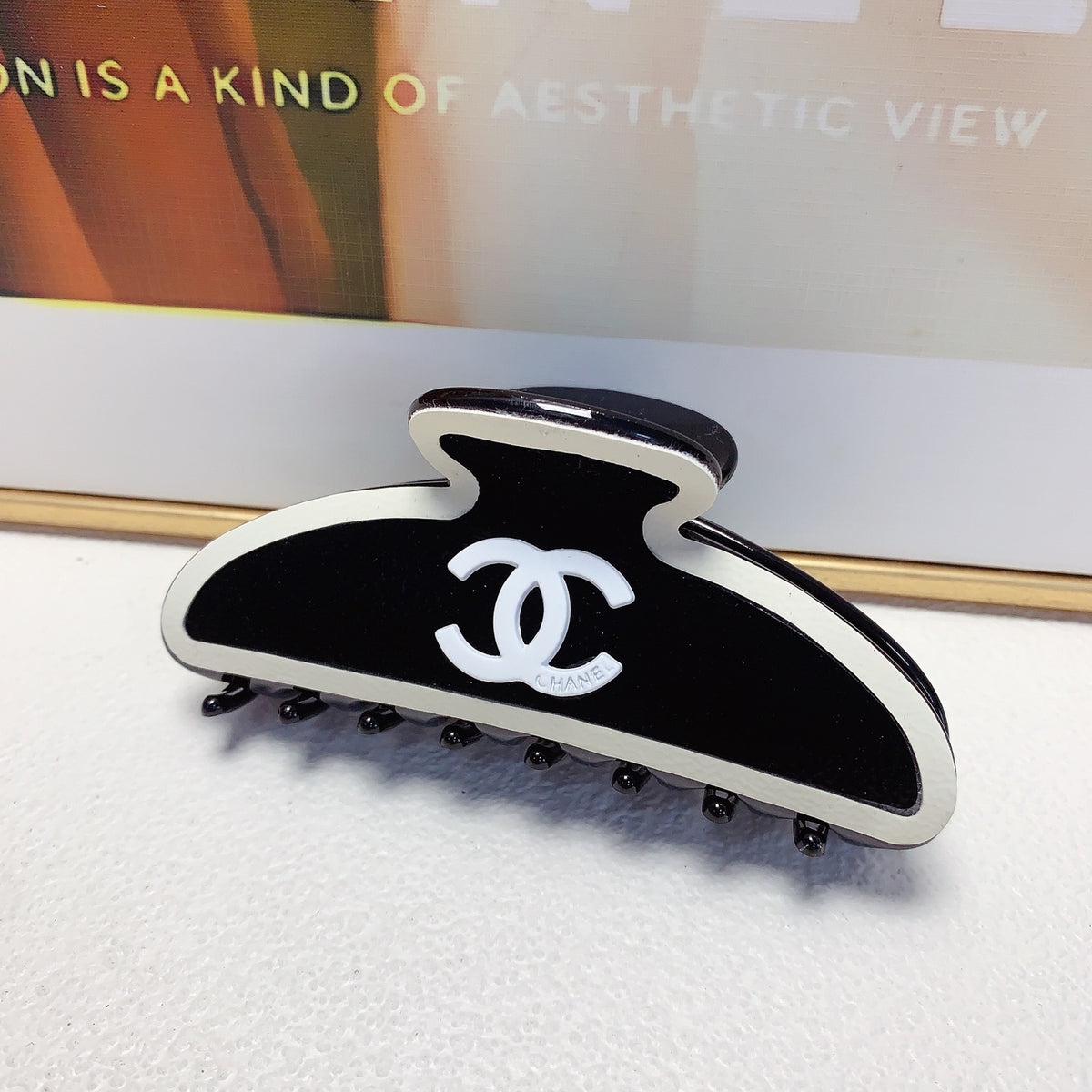 Signature Emblem Hair Clip – Black Detail main product view