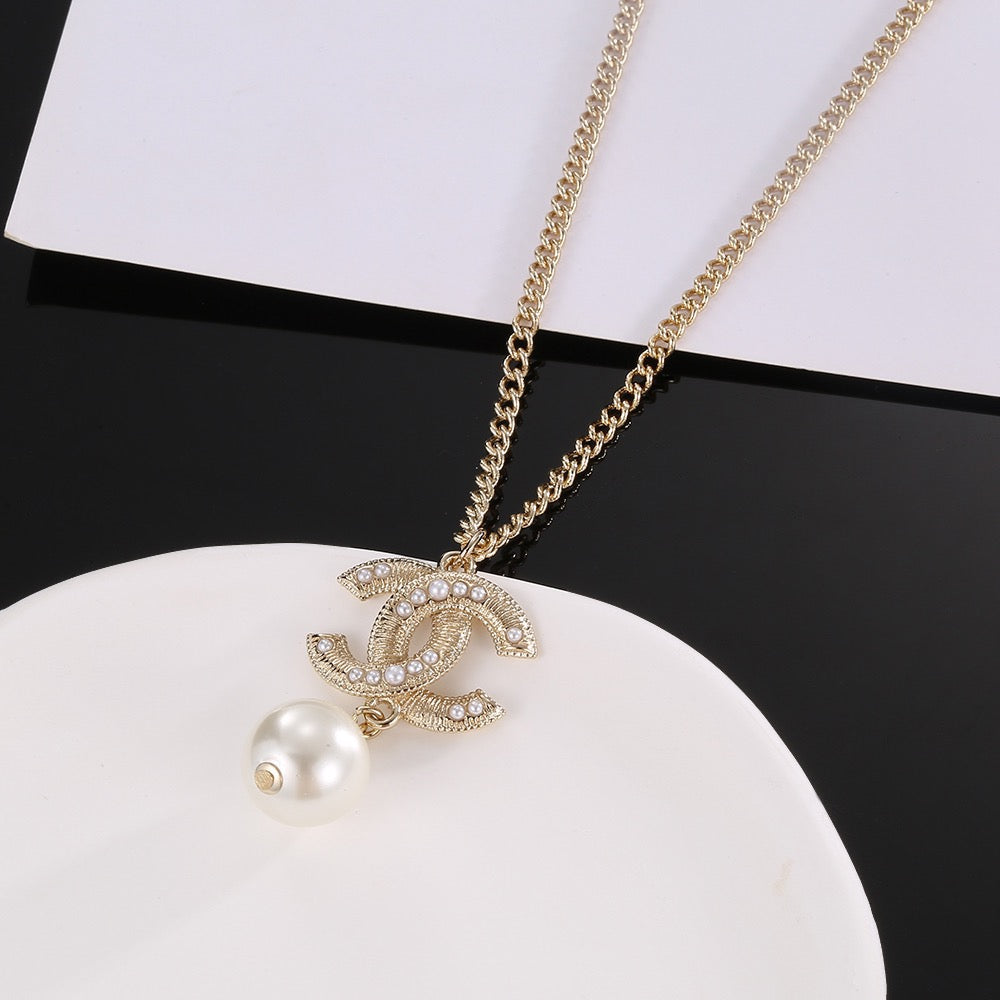 Double-C Emblem Pearl-Detail Pendant Necklace – Pearl Detail – Design 056 front product view