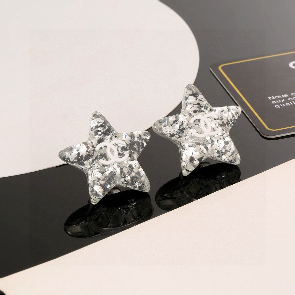 Double-C Emblem Stud Earrings in Silver-Tone – Star Detail – Design 003 detail view