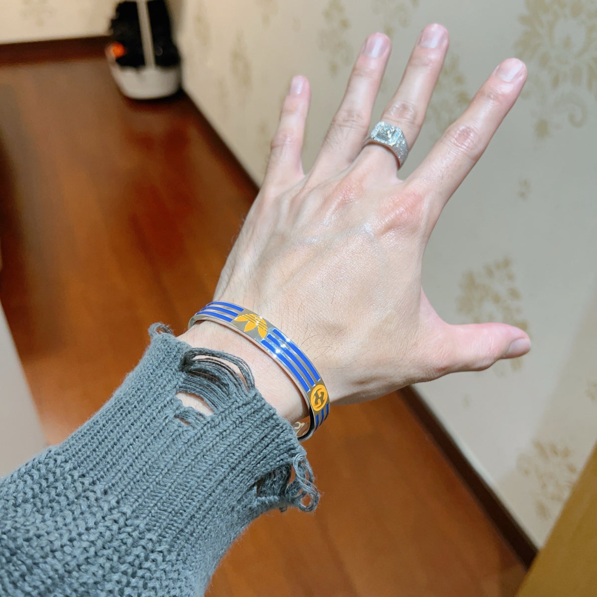 Double-G Emblem Bangle in Polished Metal-Tone – Design 022 styled product view