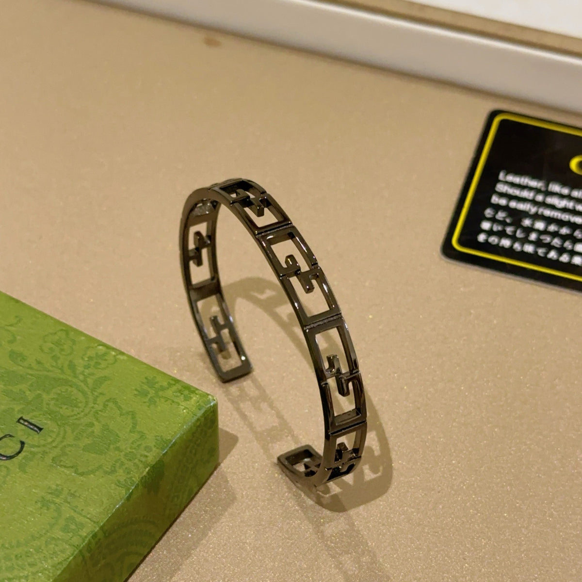 Double-G Emblem Bangle in Polished Metal-Tone – Design 020 main product view