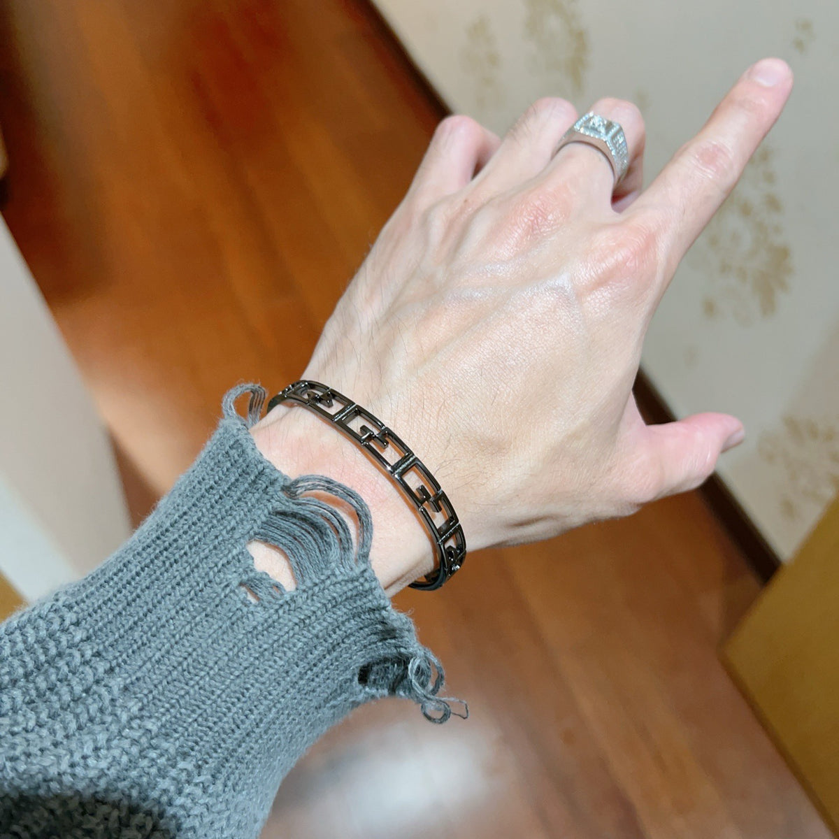 Double-G Emblem Bangle in Polished Metal-Tone – Design 020 styled product view