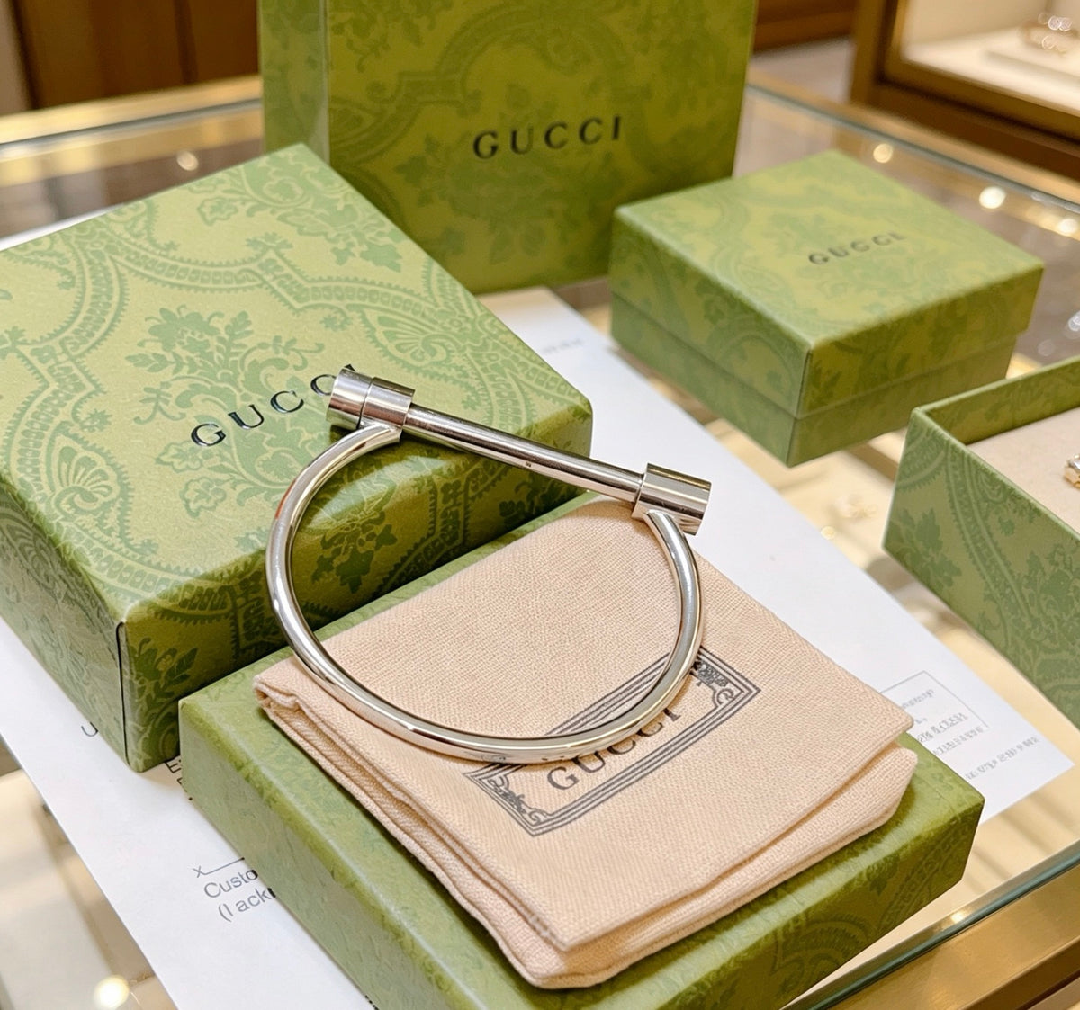 Double-G Emblem Bangle in Silver-Tone – Vintage Detail – Design 009 front product view