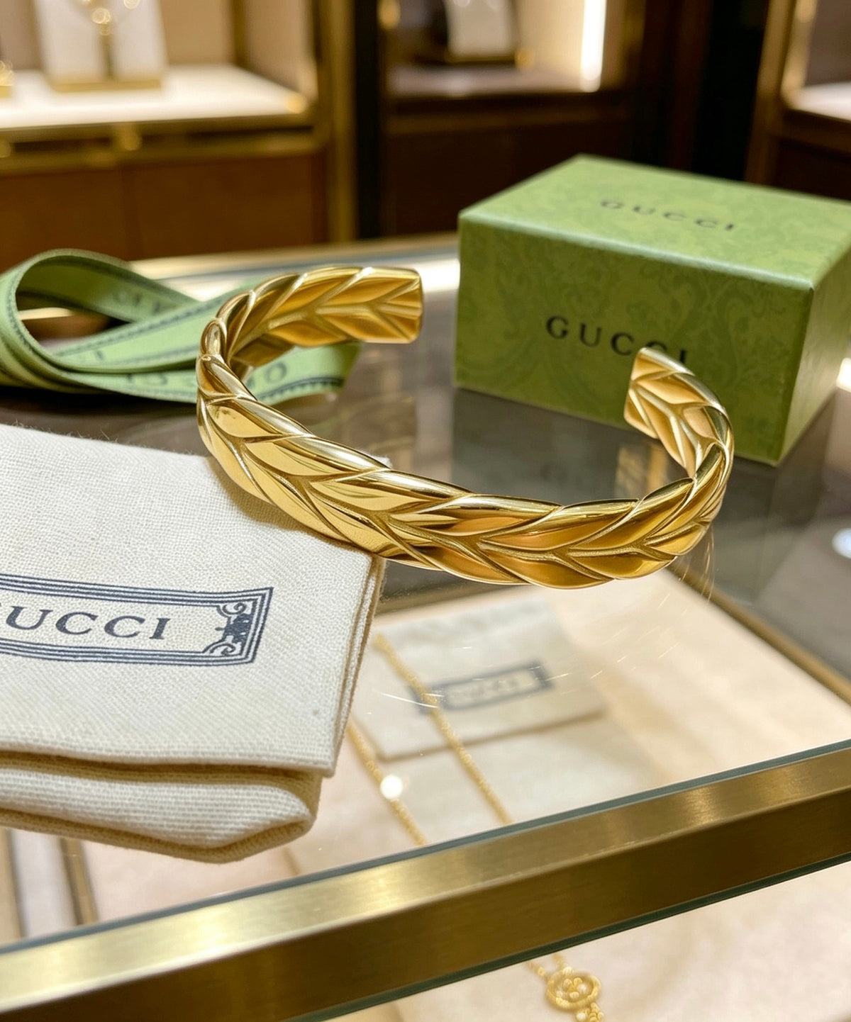 Double-G Emblem Bangle in Gold-Tone – Design 007 detail view