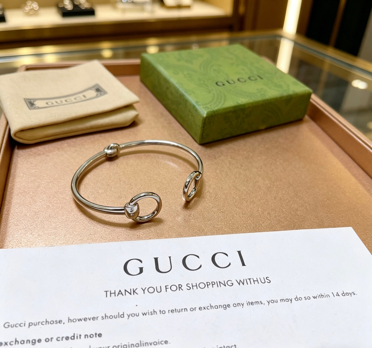 Double-G Emblem Bangle in Polished Metal-Tone – Design 018 detail view