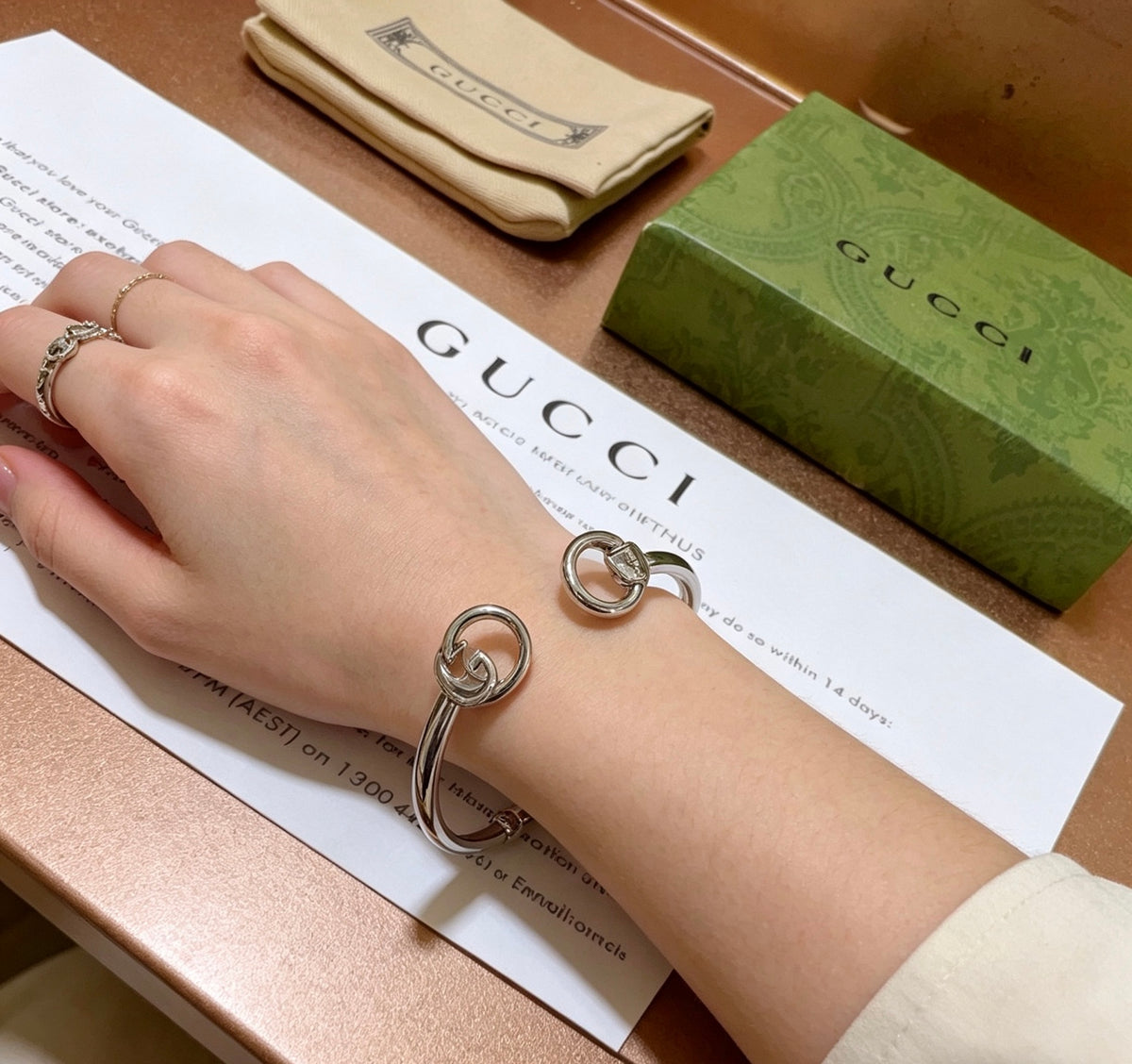 Double-G Emblem Bangle in Polished Metal-Tone – Design 023 detail view