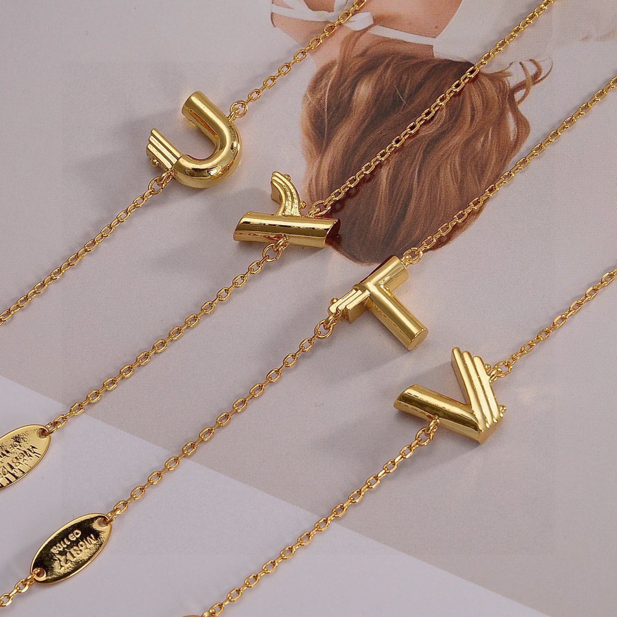 Letter Emblem Bracelet in Polished Metal-Tone – Design 029 front product view