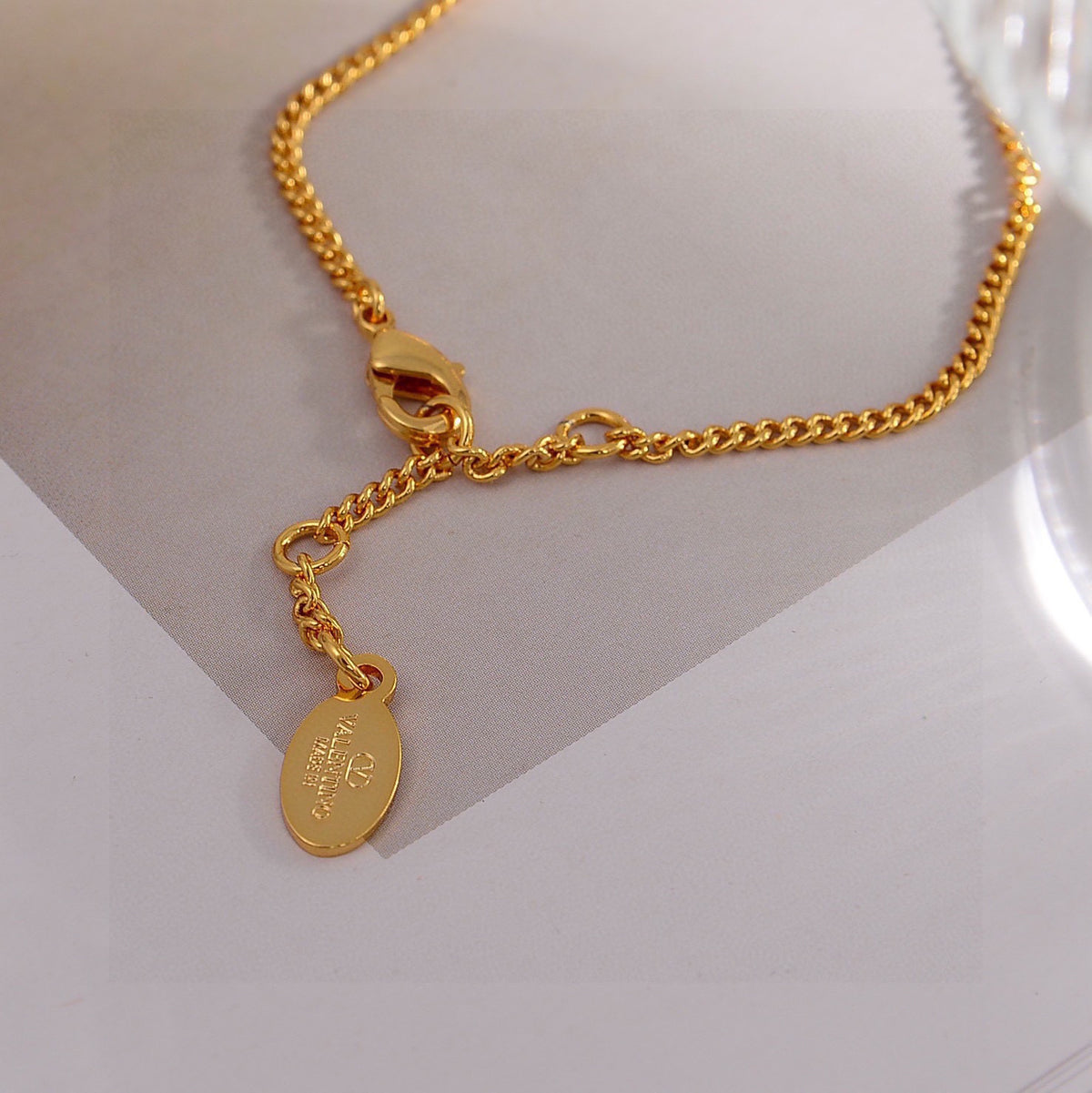 Signature Emblem Bracelet in Gold-Tone – Design 04 close-up view
