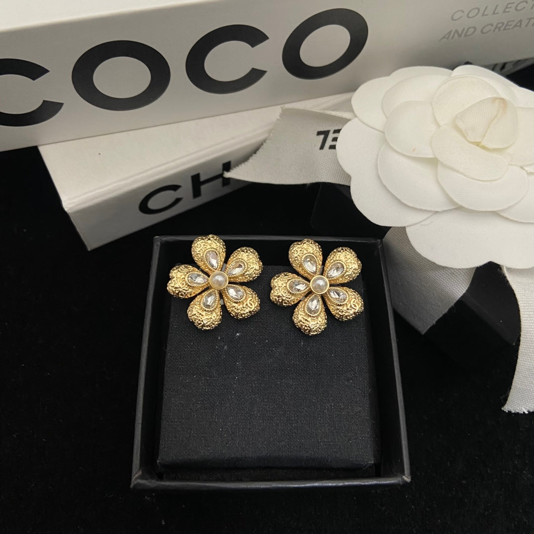Double-C Emblem Stud Earrings in Polished Metal-Tone – Design 246 front product view