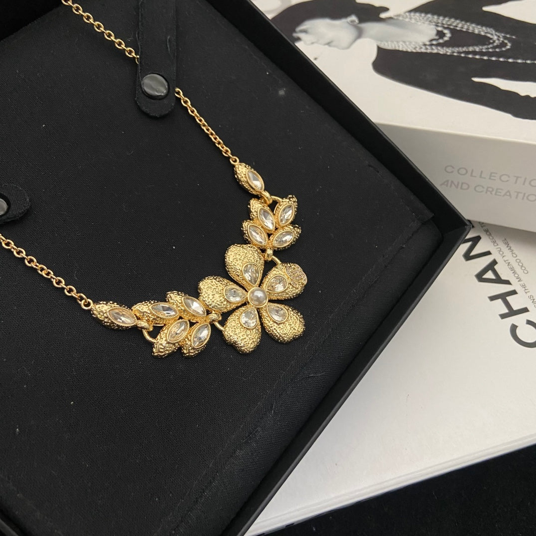 Double-C Emblem Pendant Necklace in Polished Metal-Tone – Design 034 detail view