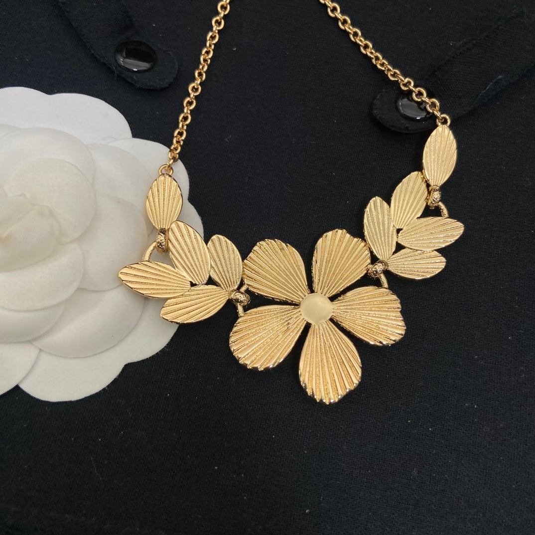 Double-C Emblem Pendant Necklace in Polished Metal-Tone – Design 034 close-up detail