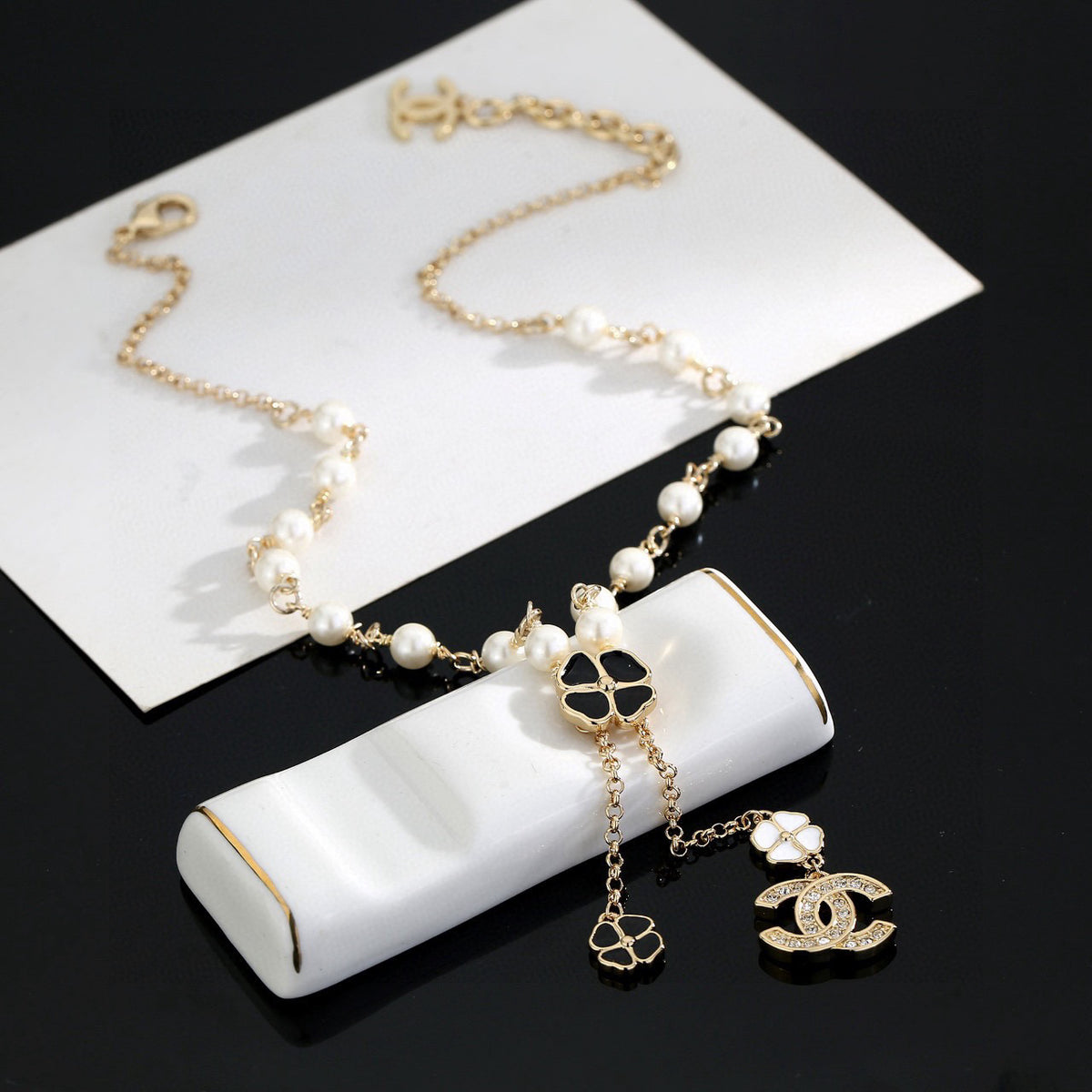 Double-C Emblem Pearl-Detail Pendant Necklace – Pearl Detail – Design 082 styled product view