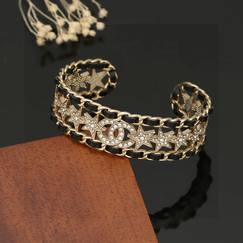Signature Emblem Bangle in Polished Metal-Tone – Black Detail – Design 007 main product view