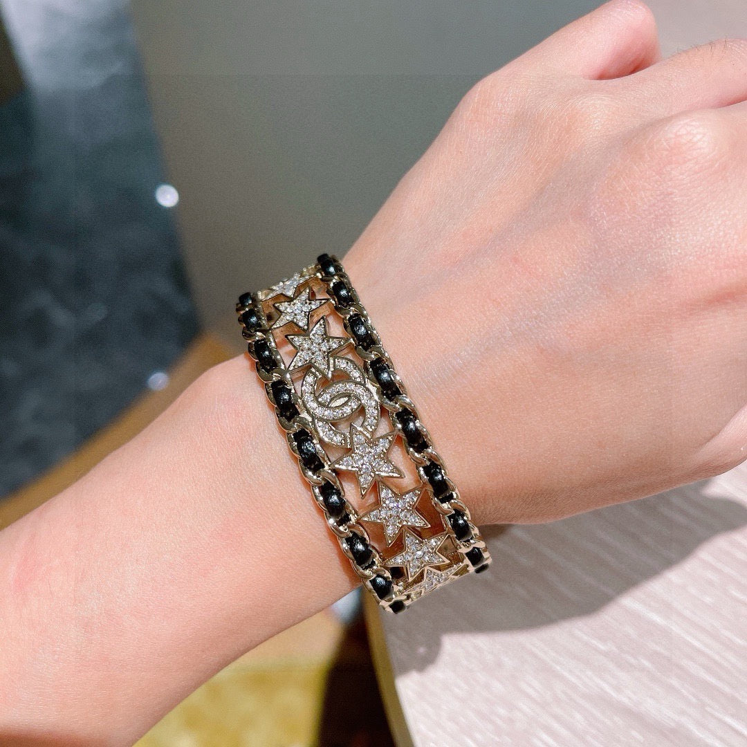 Signature Emblem Bangle in Polished Metal-Tone – Black Detail – Design 003 detail view