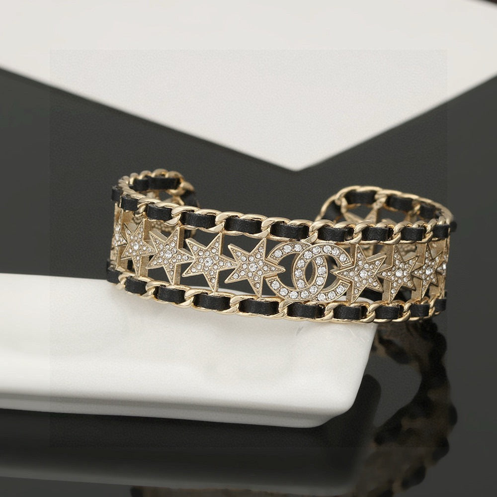 Signature Emblem Bangle in Polished Metal-Tone – Black Detail – Design 007 front product view