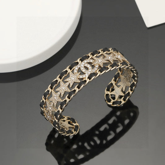 Signature Emblem Bangle in Polished Metal-Tone – Black Detail – Design 007 main product view