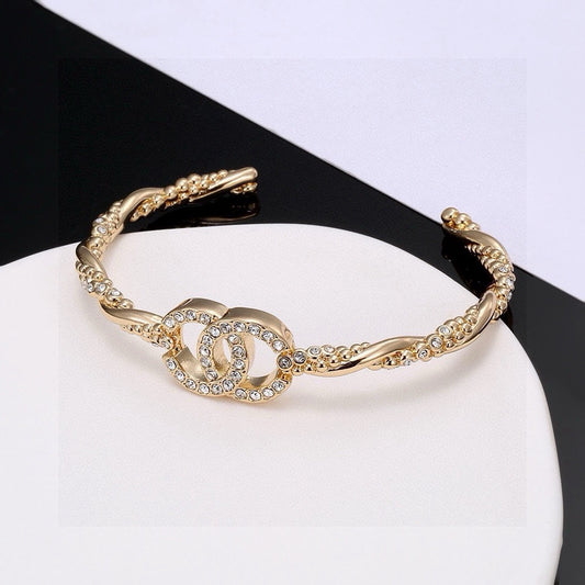Signature Emblem Bangle in Polished Metal-Tone – Design 028 main product view