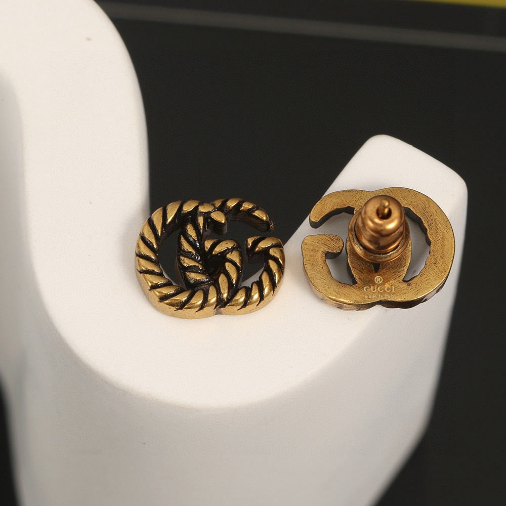 Geometric Emblem Stud Earrings in Polished Metal-Tone – Design 040 styled product view