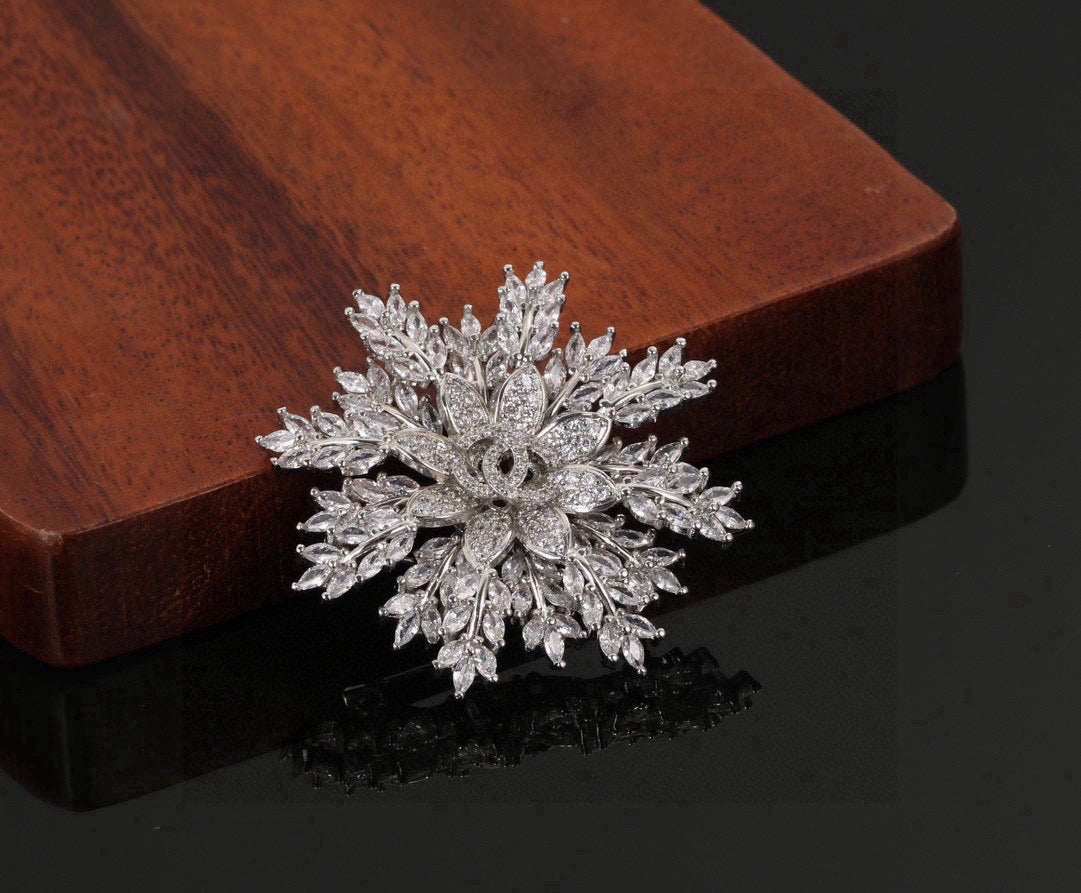 Double-C Emblem Brooch in Polished Metal-Tone – Design 046 detail view