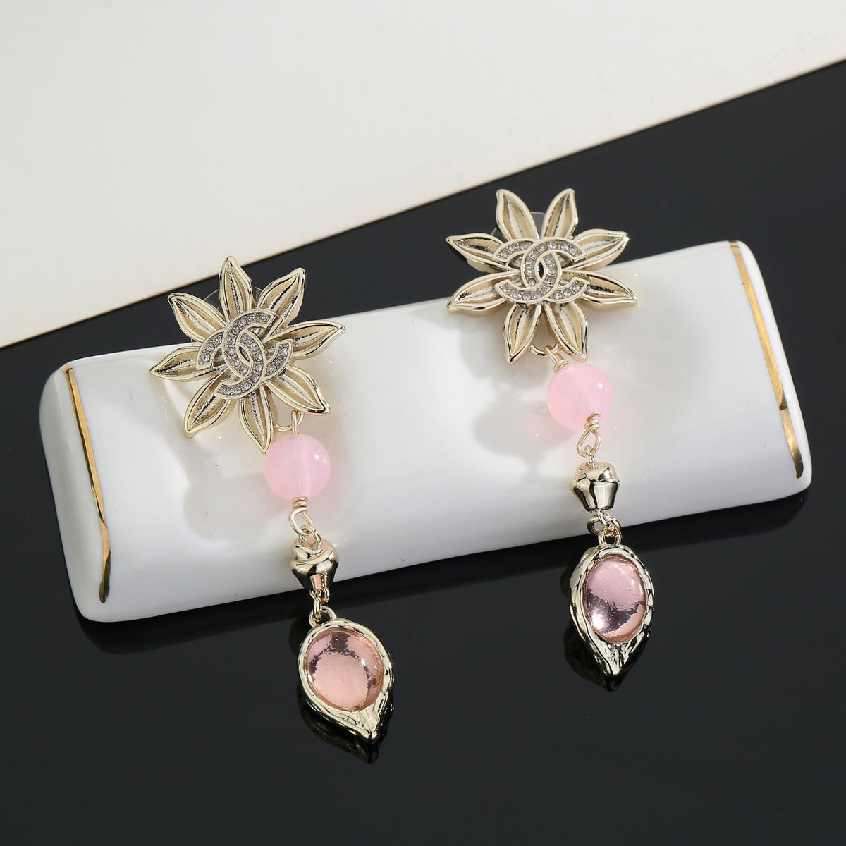 Double-C Emblem Stud Earrings in Gold-Tone – Design 028 close-up detail