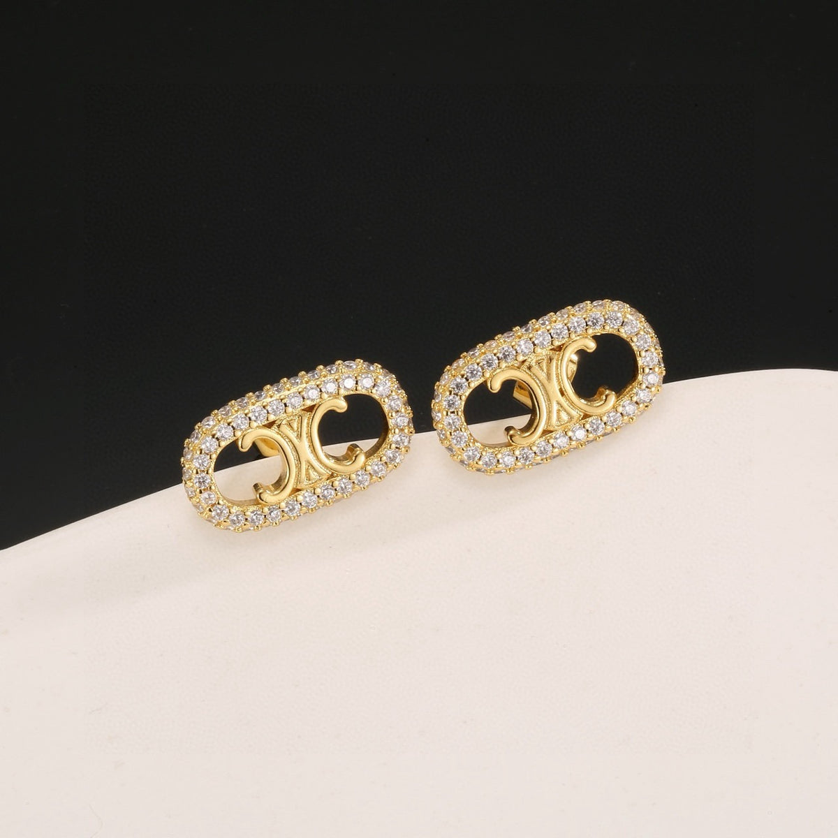 Signature Emblem Stud Earrings in Gold-Tone – Design 04 close-up view