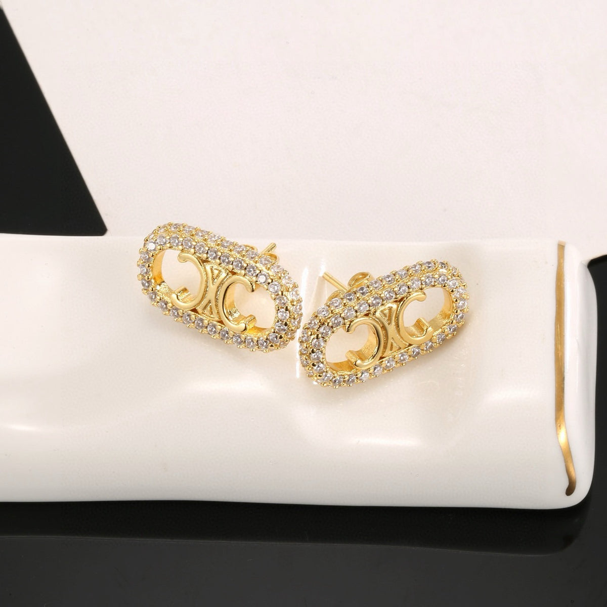 Signature Emblem Stud Earrings in Gold-Tone – Design 04 detail view
