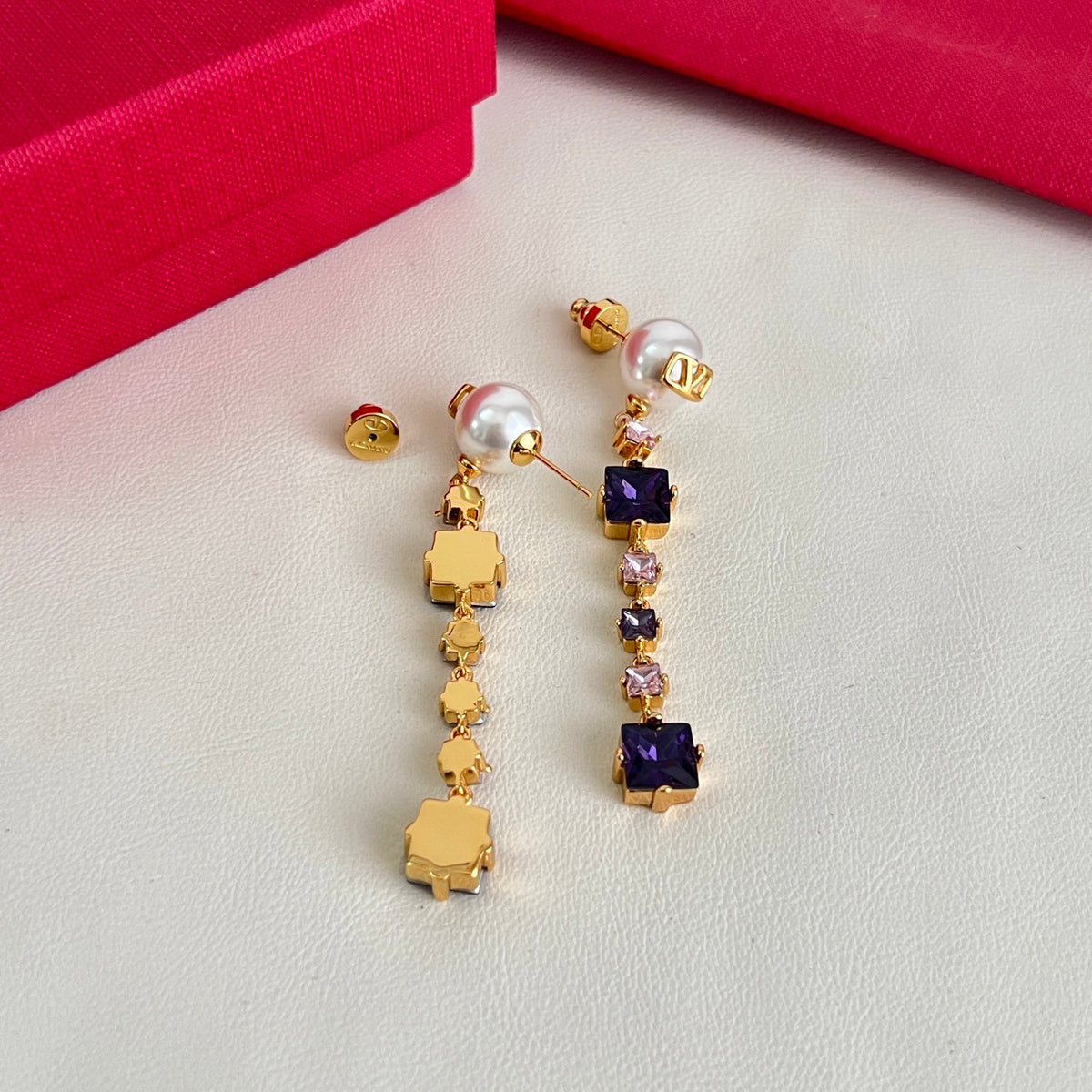 Signature Emblem Stud Earrings in Polished Metal-Tone – Design 07 close-up view