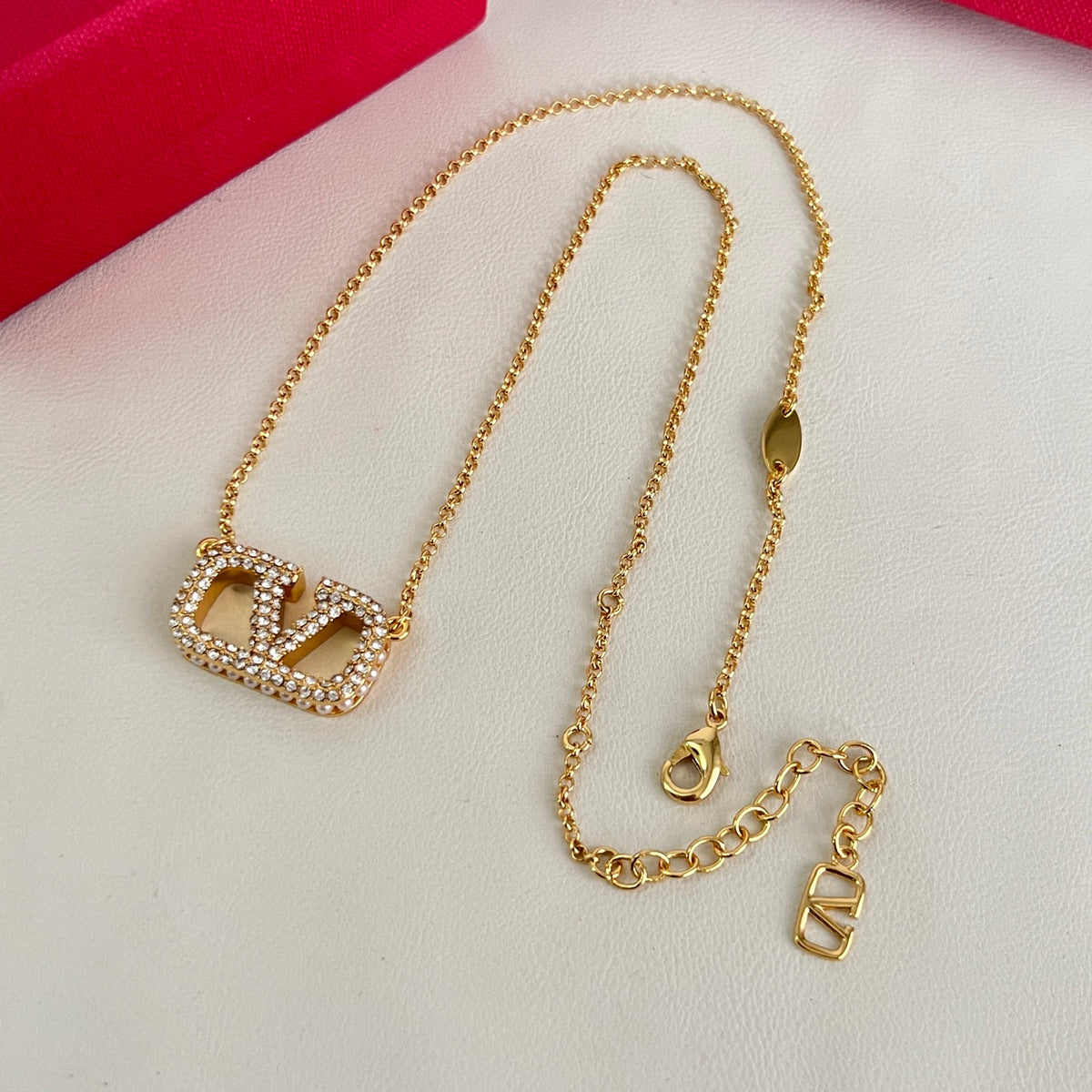 Signature Emblem Pendant Necklace in Polished Metal-Tone – Design 04 close-up view