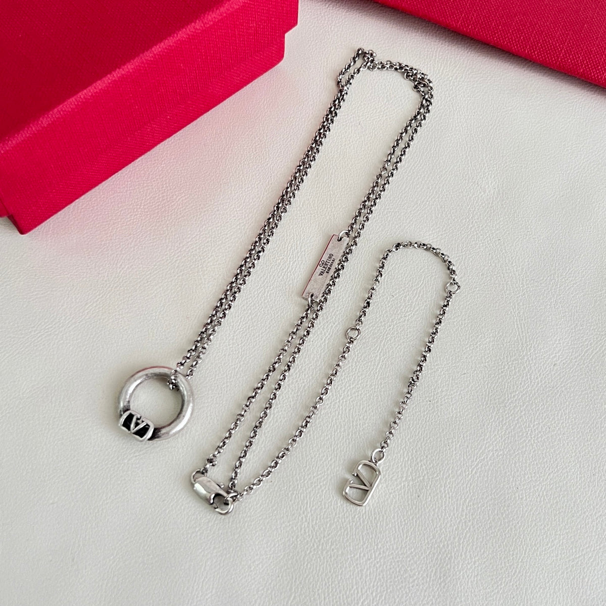 Signature Emblem Pendant Necklace in Polished Metal-Tone – Design 02 styled detail