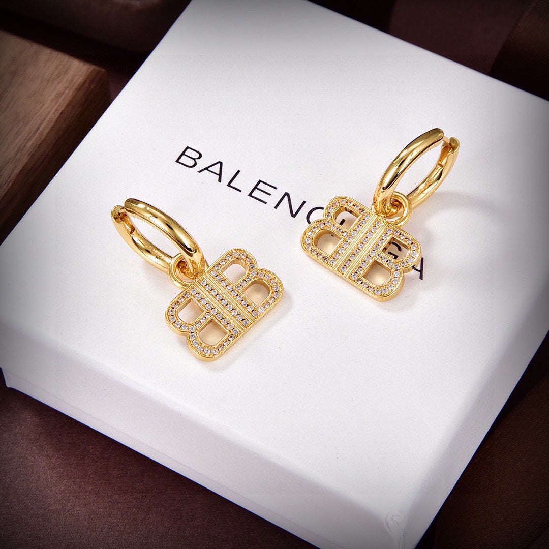 Geometric Emblem Stud Earrings in Gold-Tone – Design 008 styled product view