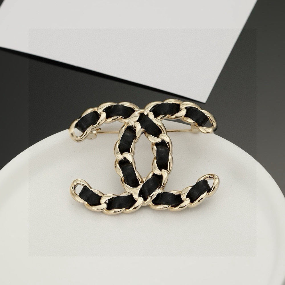 Signature Emblem Brooch in Polished Metal-Tone – Black Detail – Design 002 detail view