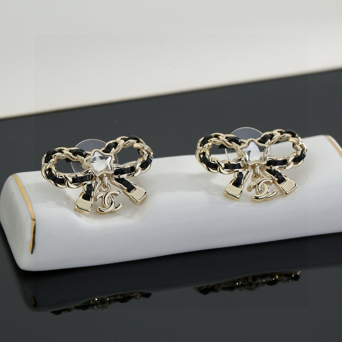 Double-C Emblem Stud Earrings in Polished Metal-Tone – Design 285 close-up detail