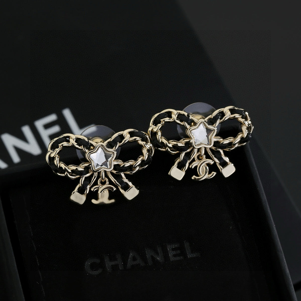 Double-C Emblem Stud Earrings in Polished Metal-Tone – Design 285 detail view