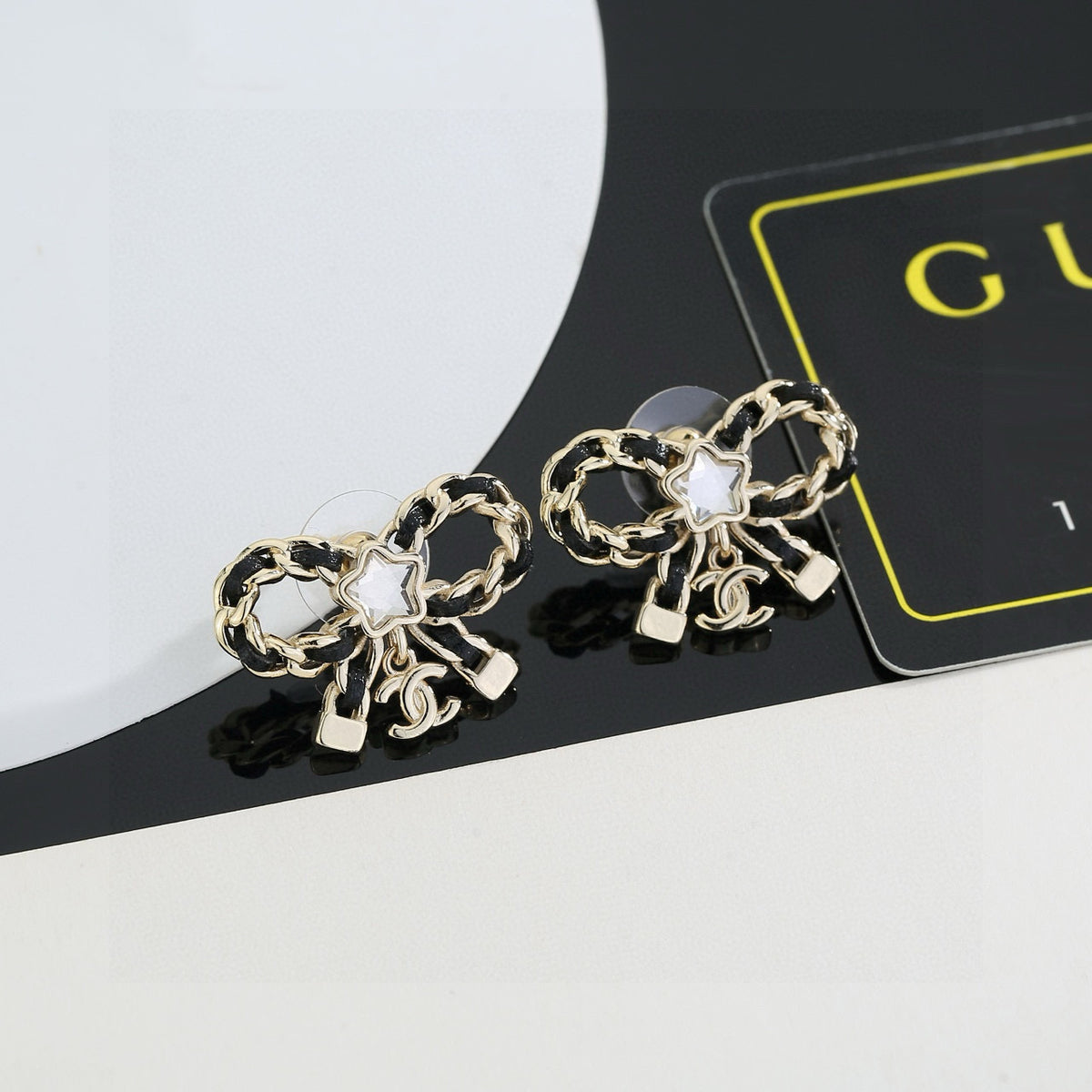 Double-C Emblem Stud Earrings in Polished Metal-Tone – Design 285 front product view