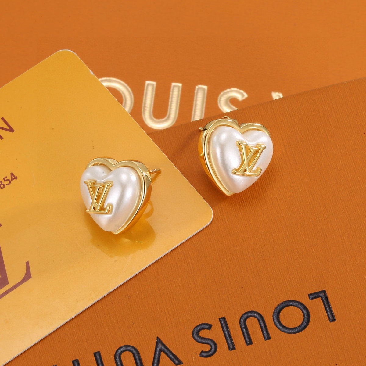 Letter Emblem Stud Earrings in Polished Metal-Tone – Design 021 main product view